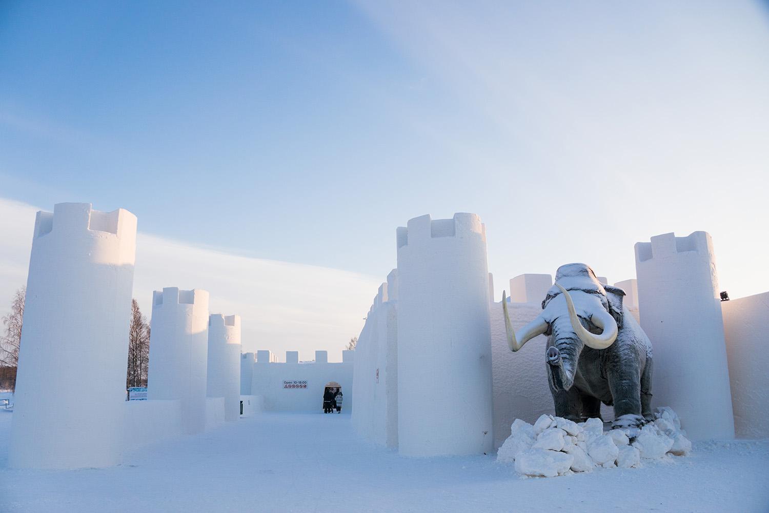 Kemi Tourism Ltd. in front of the SnowCastle