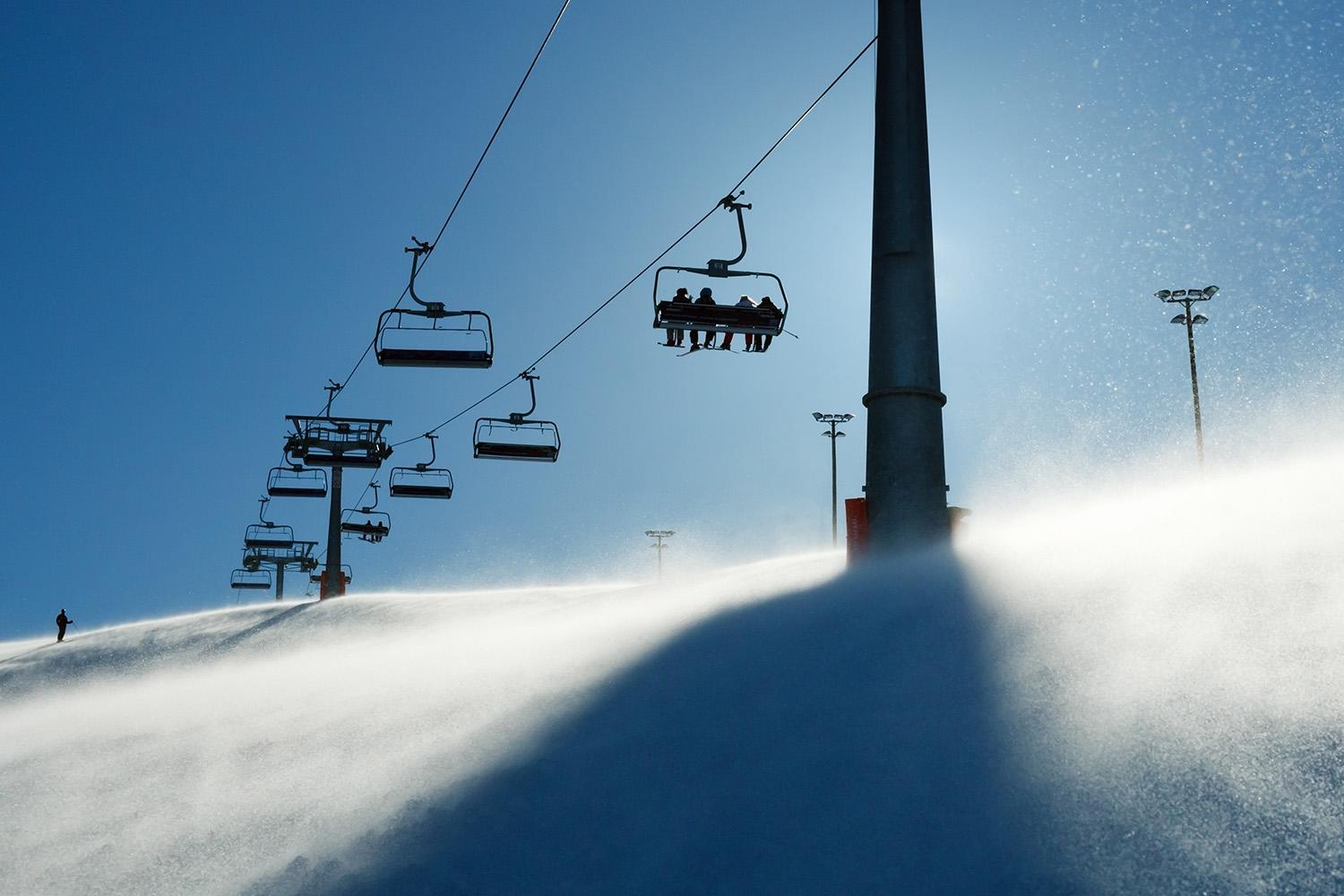 Backlit,Scenes,With,Ski,Lift,Chairs,On,Hillside,,Levi,Ski