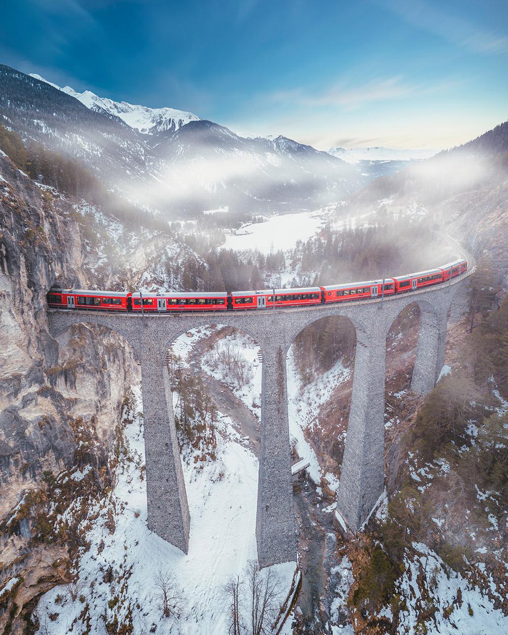Filisur,,Switzerland,-,March,05,,2018:,Red,Train,Over,The