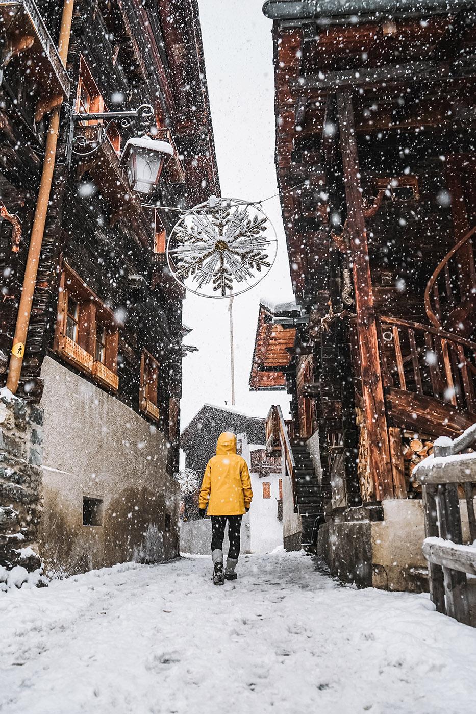 Crossing,The,Village,Of,Grimentz,In,Switzerland,During,The,Christmas